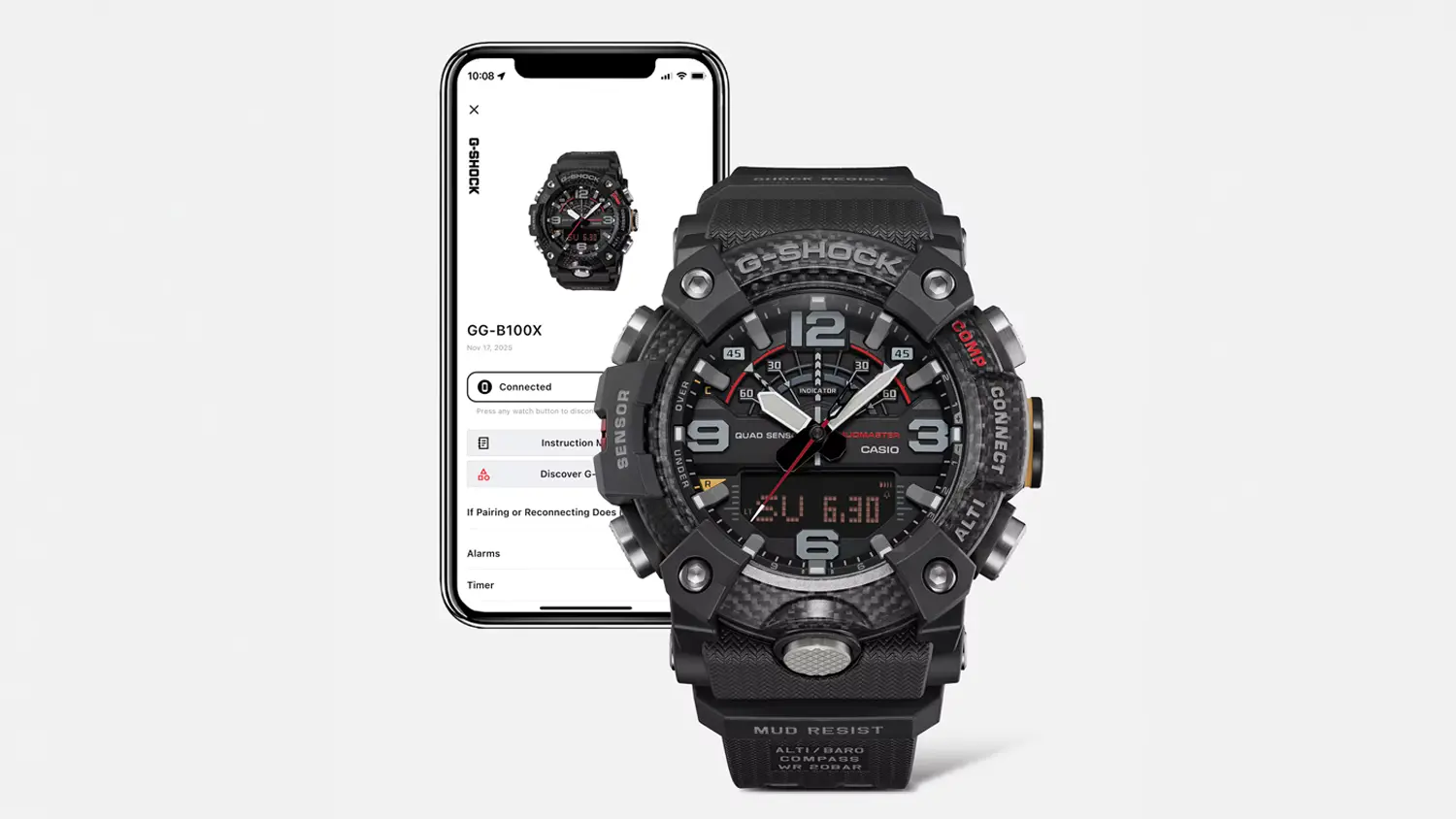 Pánske náramkové hodinky Casio GG-B100X-1AER s mobilom v pozadí, v ktorom je otvorená aplikácia CASIO WATCHES