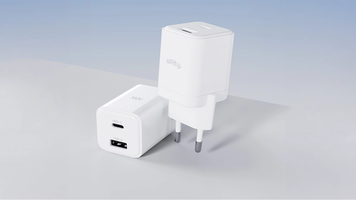S&iacute;ťov&aacute; nab&iacute;ječka Allity GaN PD QC 1x USB-C 1x USB-A 30W b&iacute;l&aacute; na modr&eacute;m pozad&iacute;