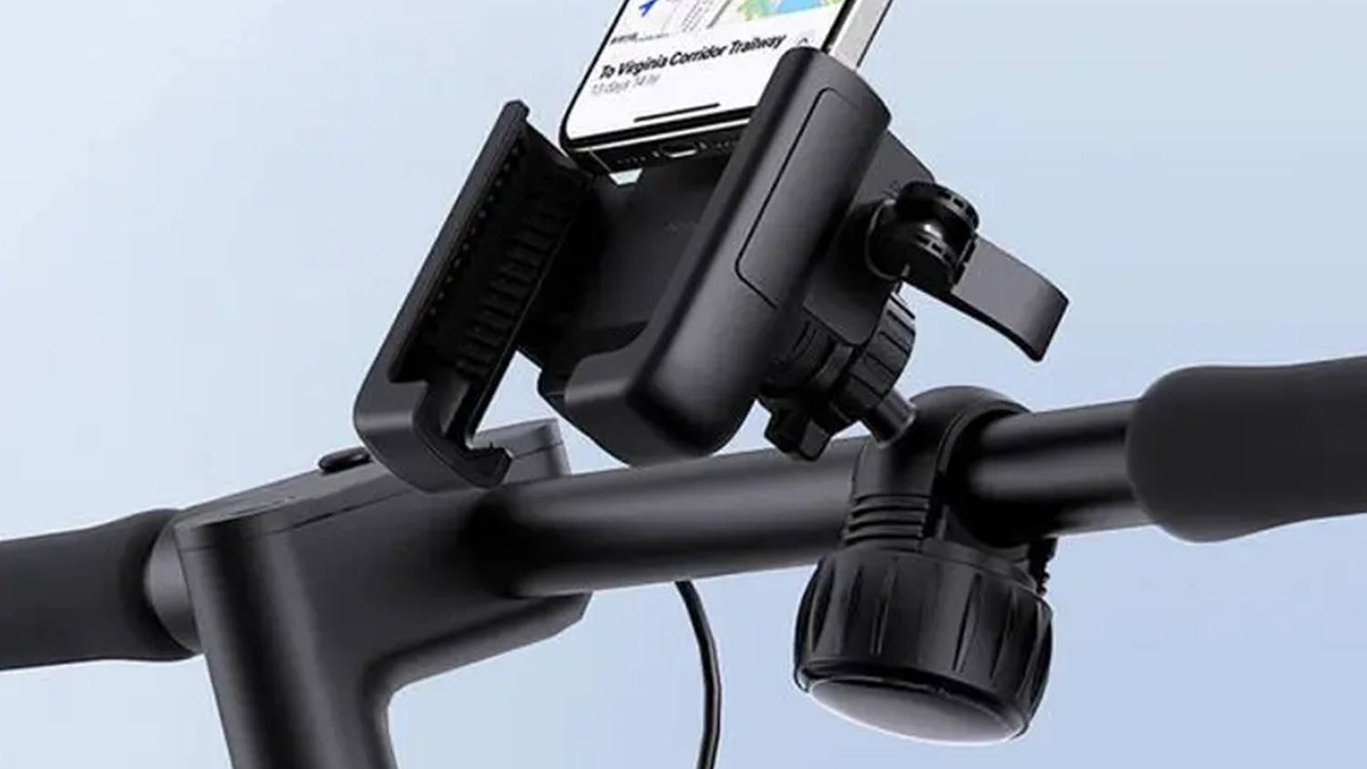 Drž&aacute;k telefonu Baseus GoTrip upevněn&yacute; na ř&iacute;d&iacute;tk&aacute;ch