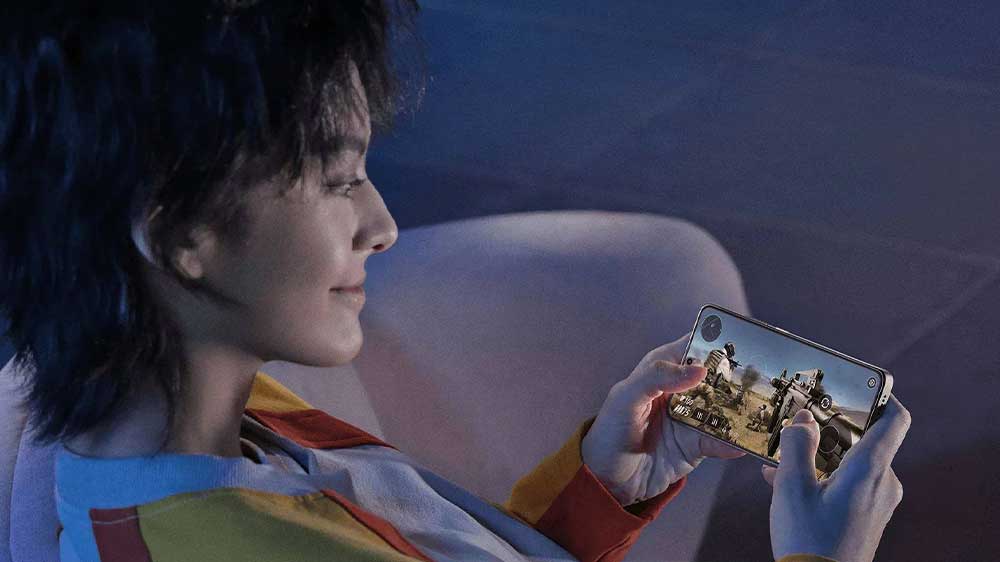 Mobiln&iacute; telefon Poco X7 Pro 5G 6 GB/128 GB žena hraj&iacute;c&iacute; hry_03