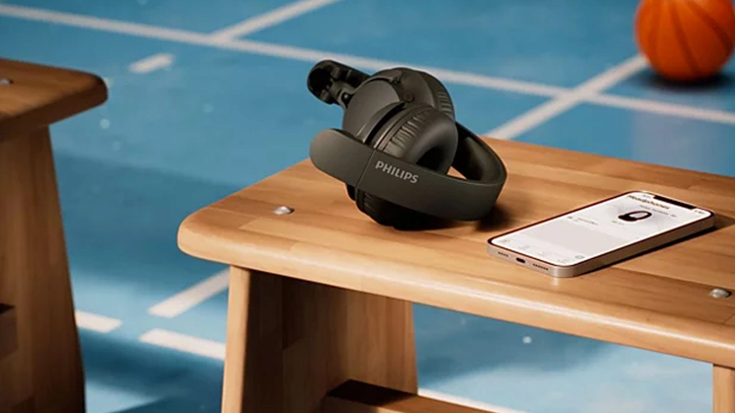 Bezdrôtové slúchadlá Philips TAH4500BK/00 na stolíku