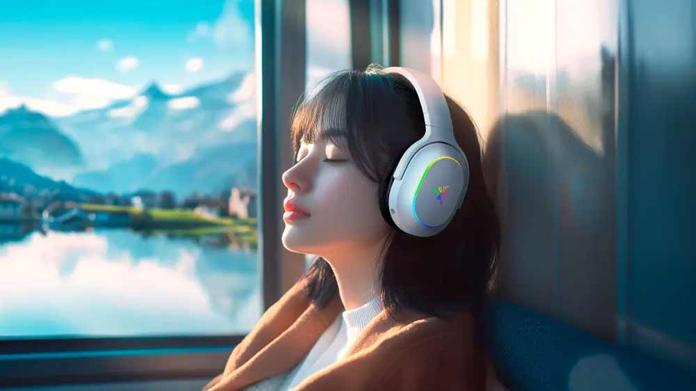 Bezdrátová herní sluchátka Razer Barracuda X Chroma na hlavě dívky_04