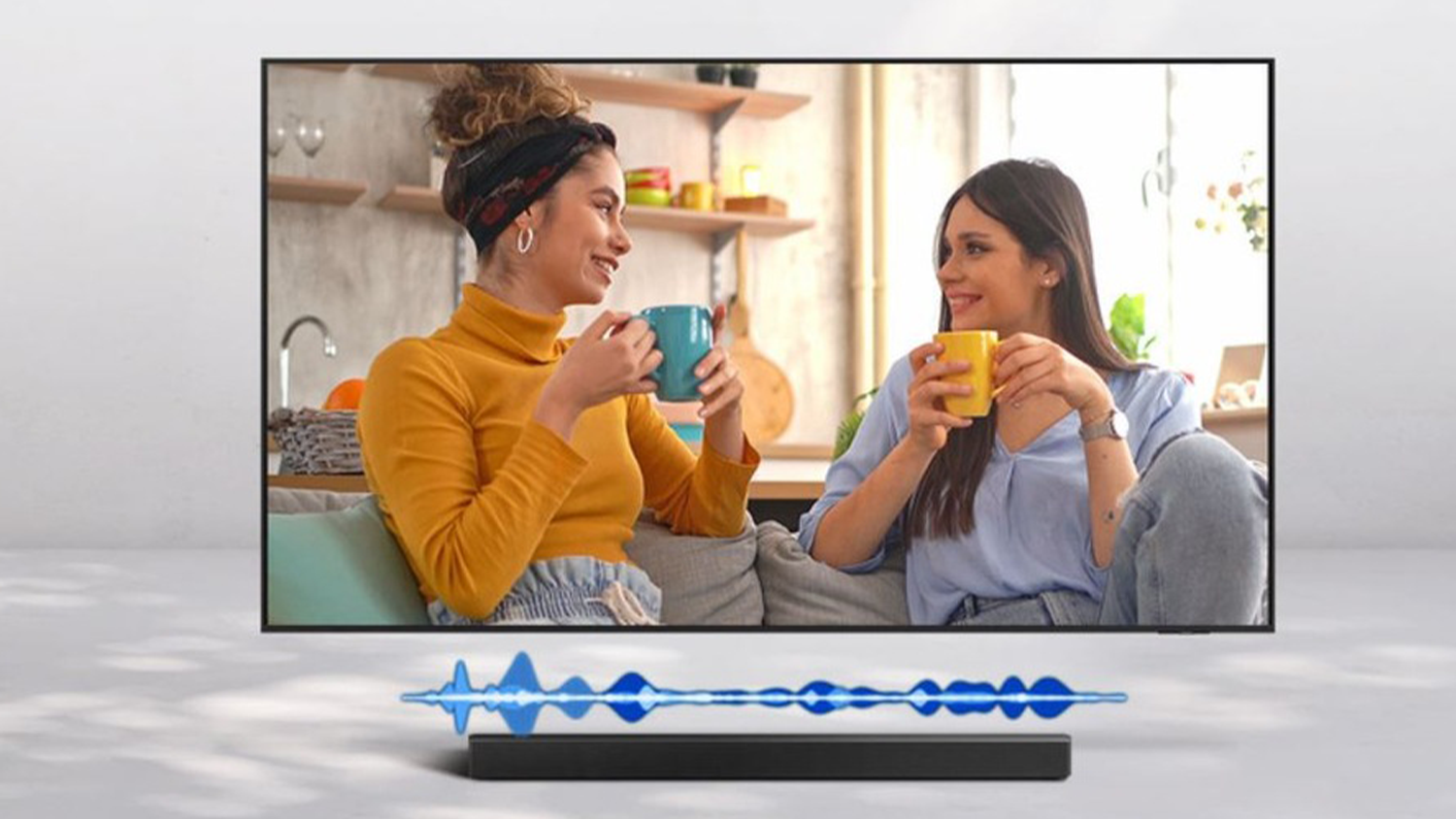 Scéna v televizi s vizualizací křivky audia nad soundbarem
