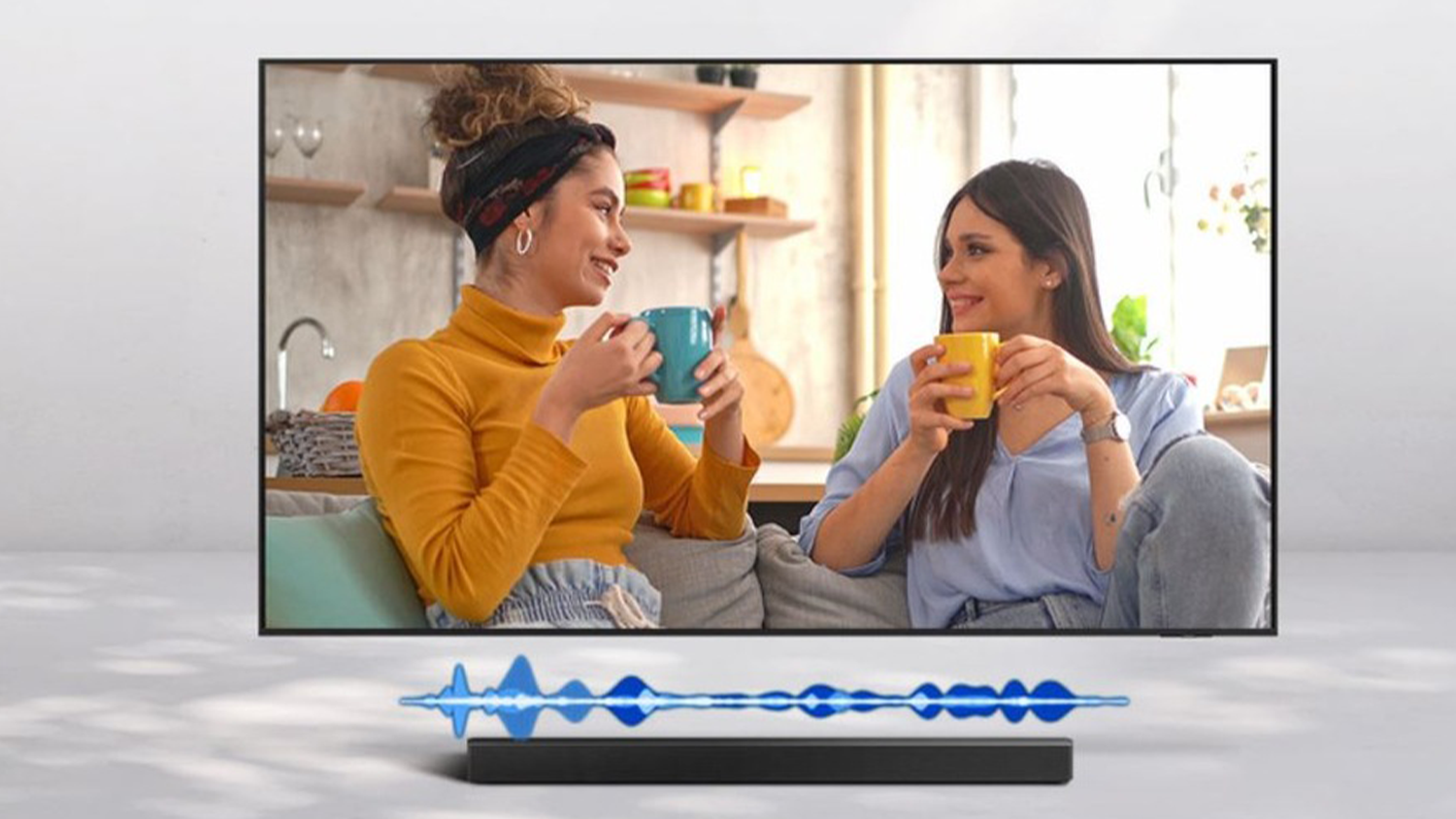 Scéna v televizi s vizualizací křivky audia nad soundbarem