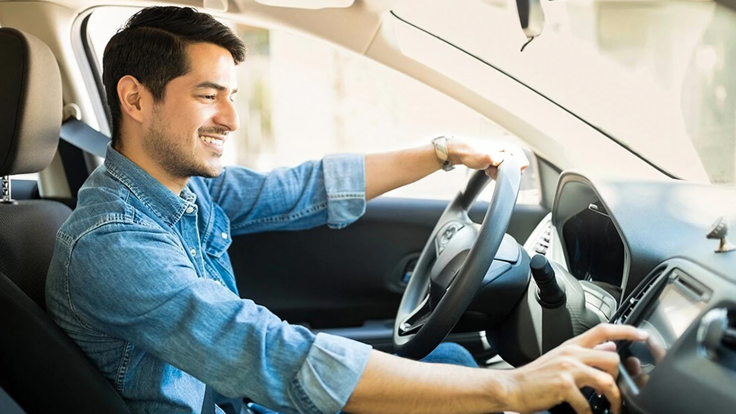 Man operating a car radio