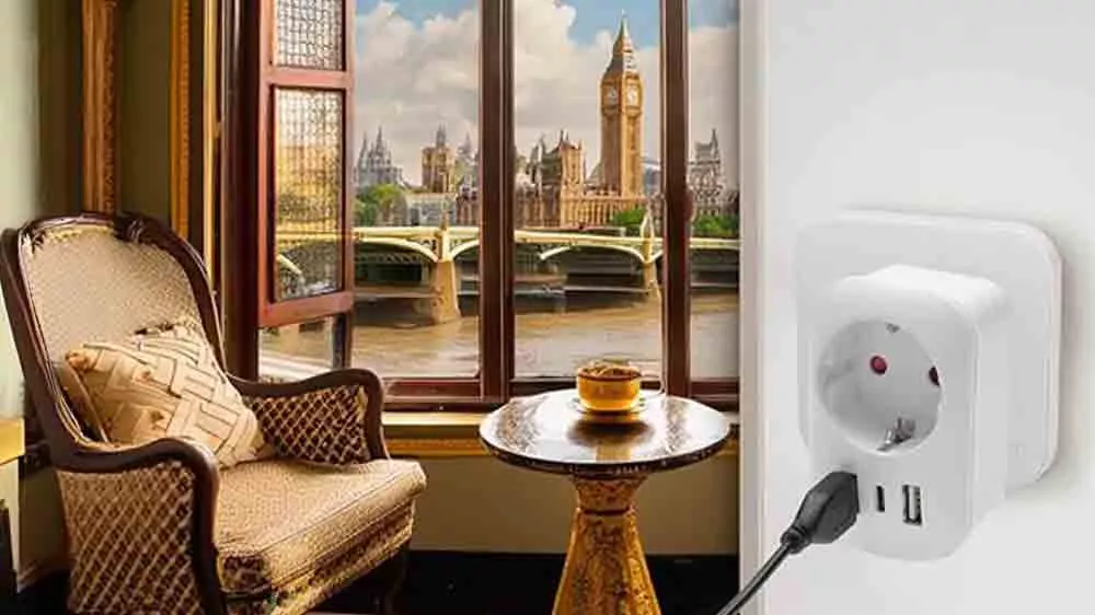 Okno otevřen&eacute; na Big Ben a v ob&yacute;v&aacute;ku v cestovn&iacute;m adapt&eacute;ru zapojen&yacute; kabel_02
