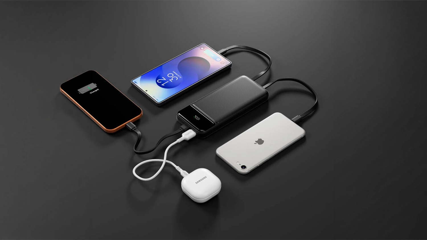 Tři mobiln&iacute; telefony a sluch&aacute;tka zapojen&aacute; do powerbanky Spello SP11 10 000mAh