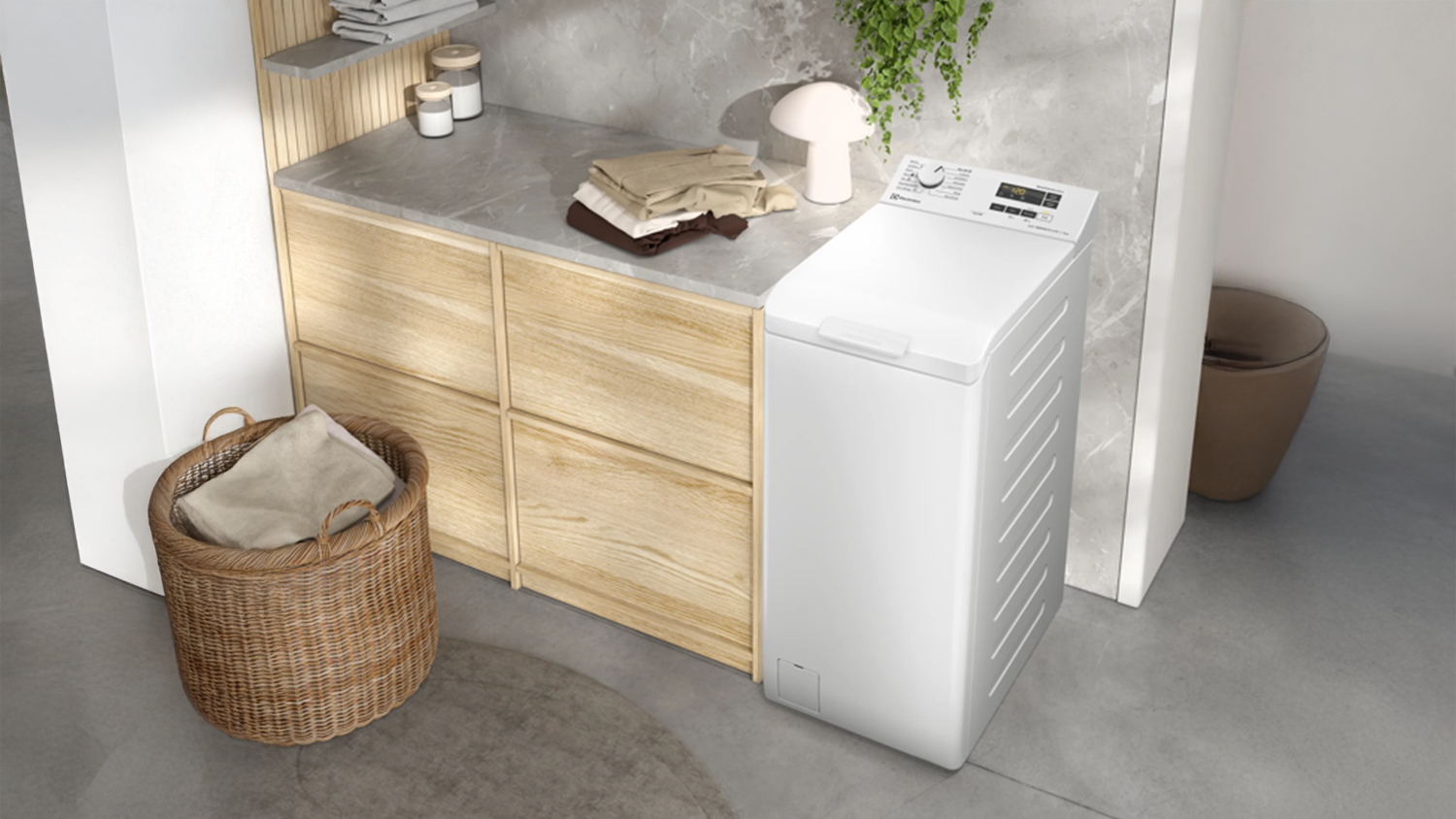 Pračka s vrchn&iacute;m plněn&iacute;m Electrolux EW6T126E v interi&eacute;ru