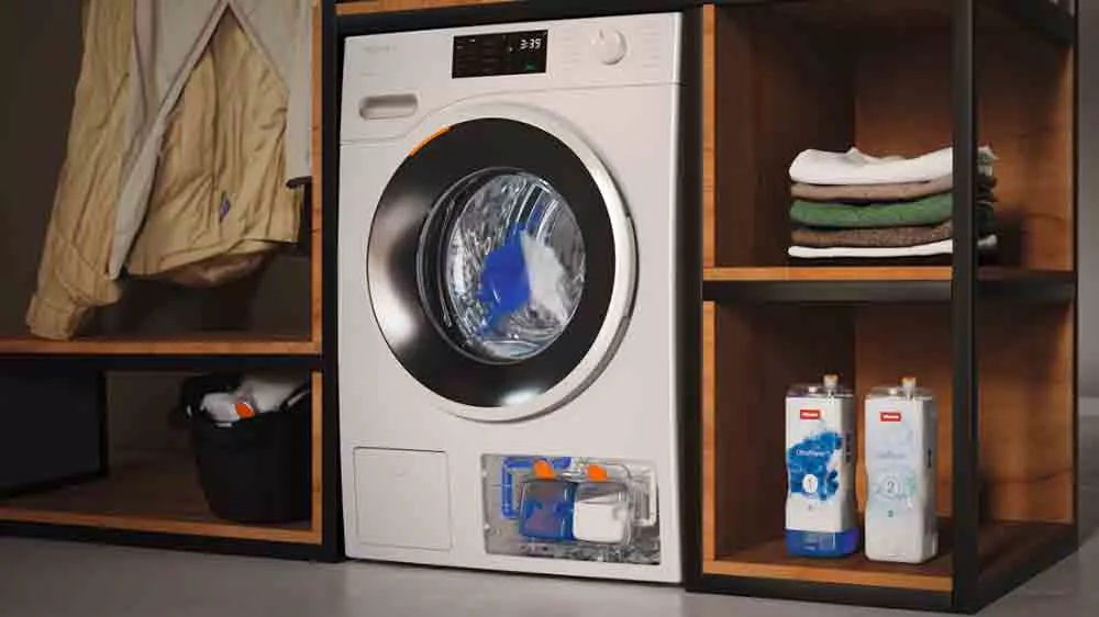 Miele UltraPhase 1 s pračkou a ručníky v policích_02