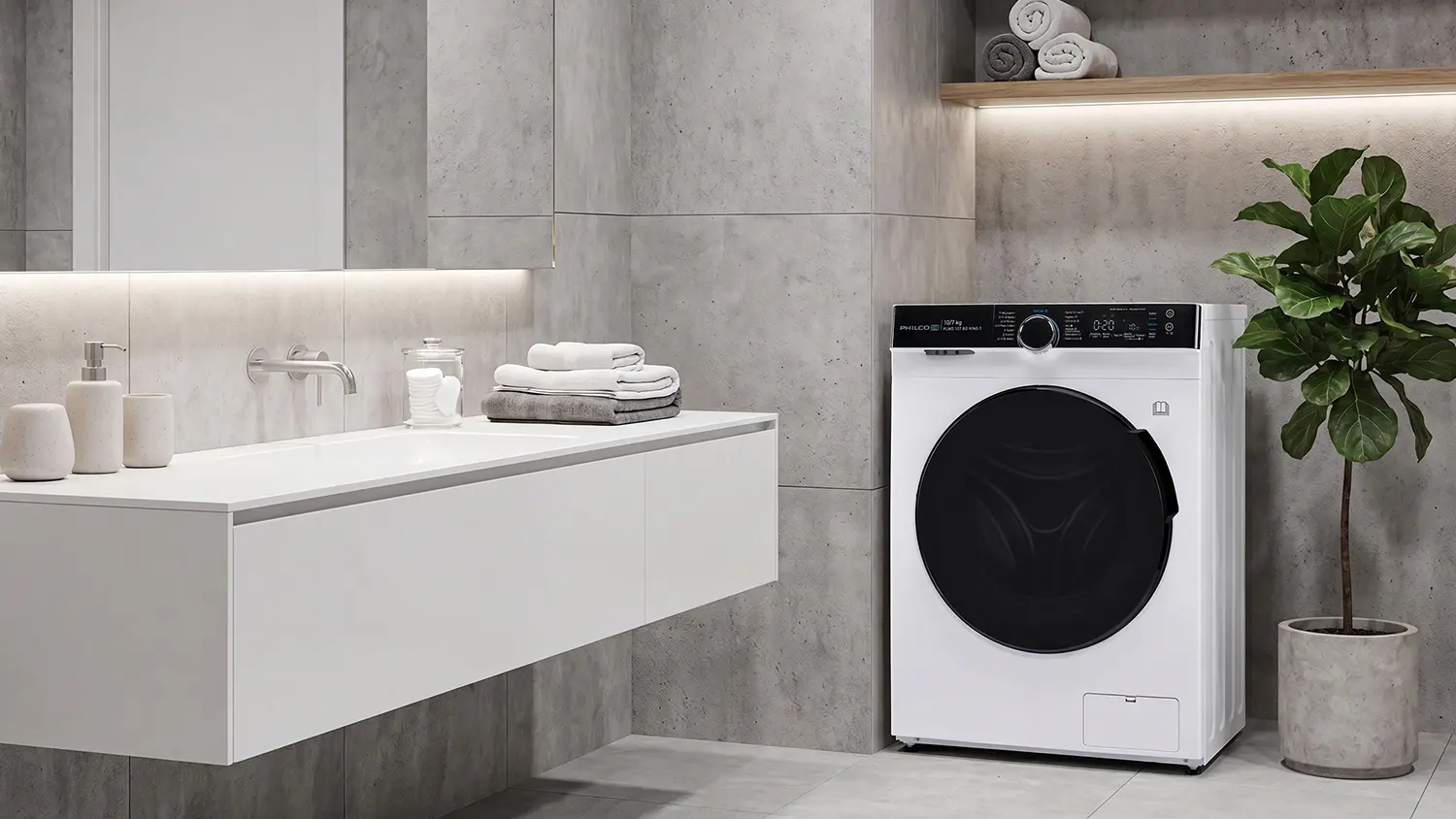 Pračkosuička Philco PLWD 107 BD King 3 umstěn v koupelně.