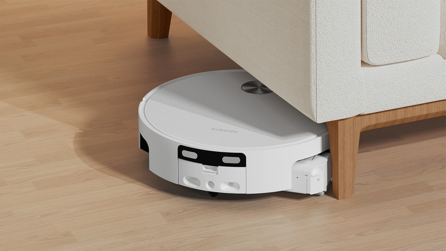 Robotick&yacute; vysavač Xiaomi Robot Vacuum 6 pod n&aacute;bytkem