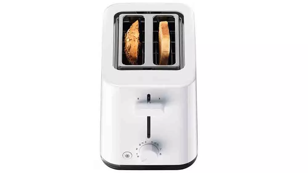 Topinkovač Braun Breakfast 1 HT1010.WH s pl&aacute;tky pečiva