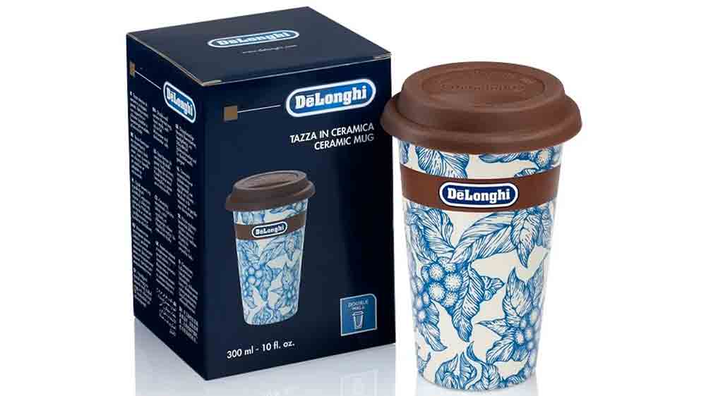 Termo hrnek De'Longhi DLSC064 stojící vedle originálního obalu