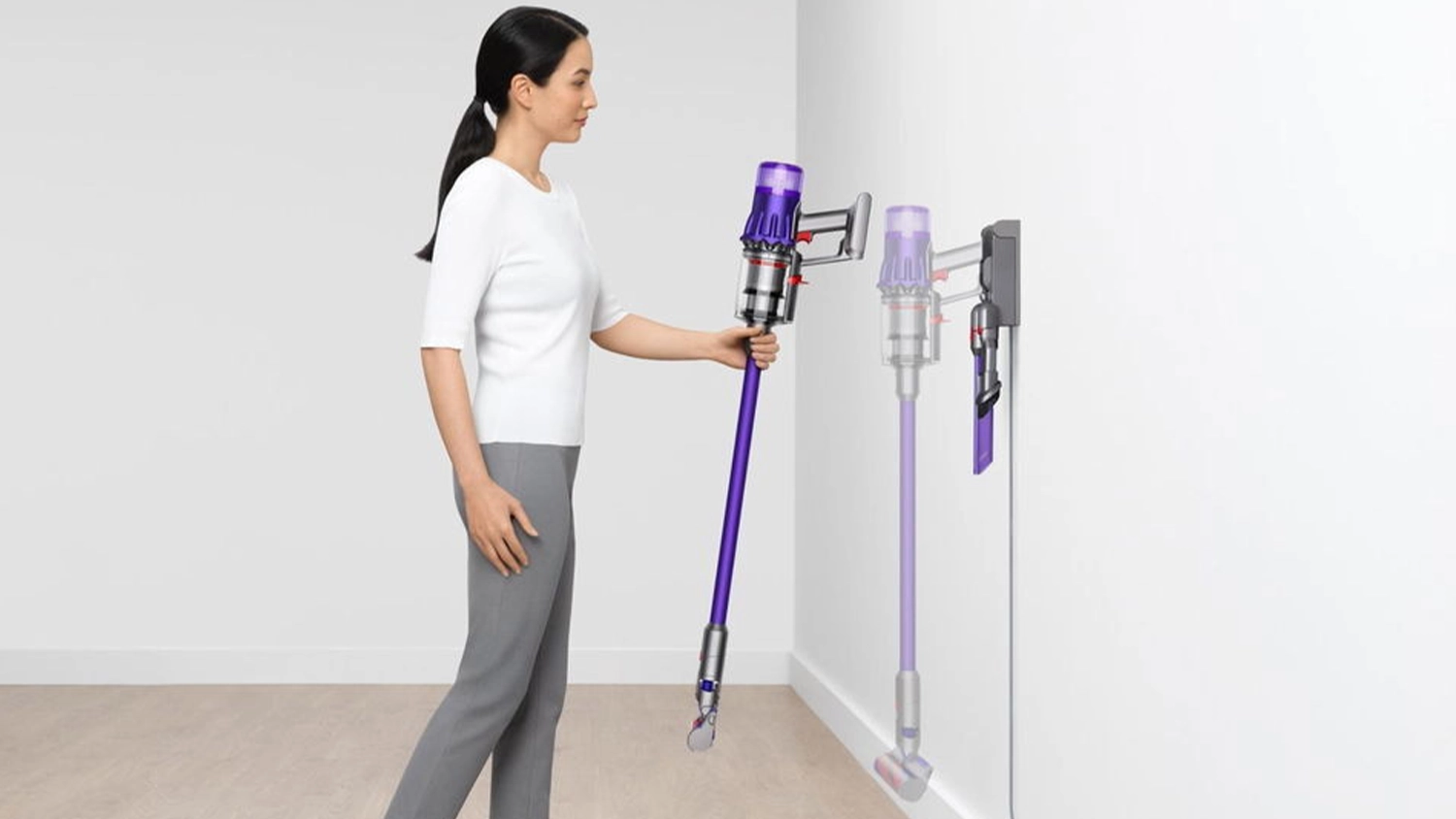 Žena d&aacute;va Dyson Digital Slim Fluffy vys&aacute;vač na stenu _04