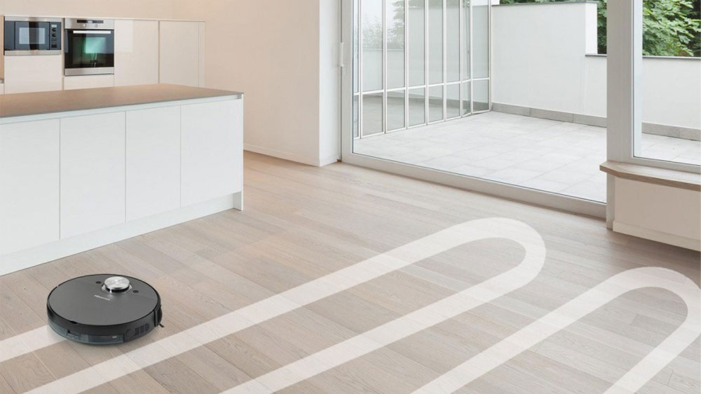 Robotický vysavač 2v1 Hisense RVCL144ABEVO vysávající v kuchyni_02