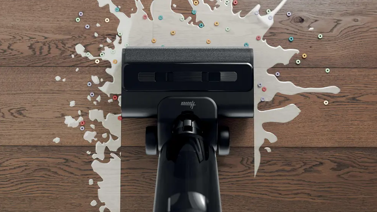 Tyčov&yacute; vys&aacute;vač s mopom Hoover HW300 011 Wet & Dry upratuje rozliate mlieko