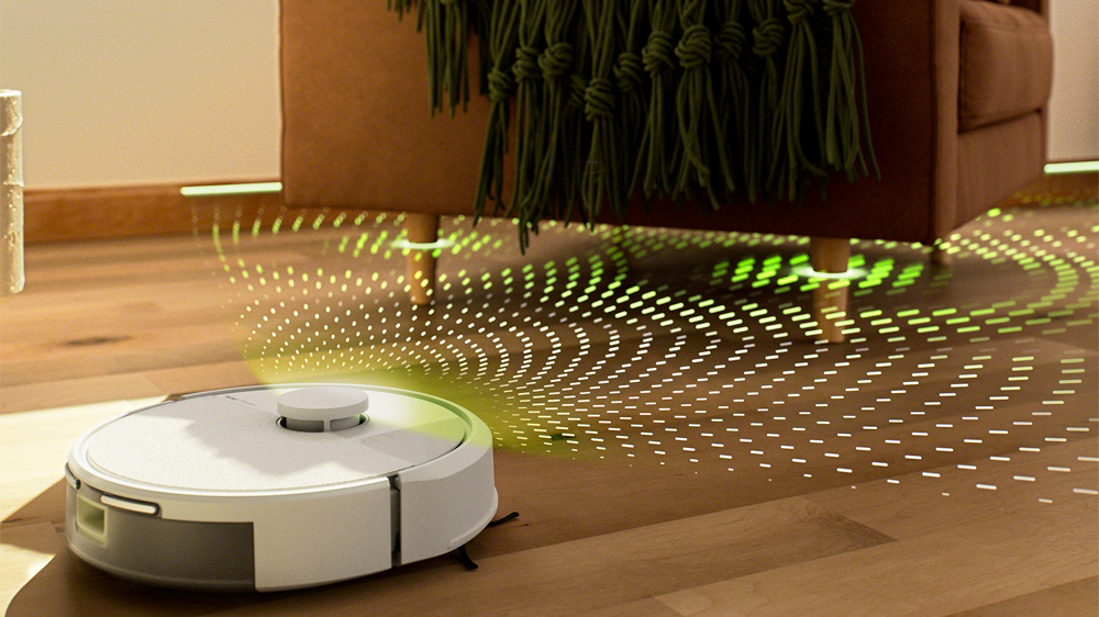 Robotický vysavač s mopem iRobot Roomba 105 při vysávání nečistot_02