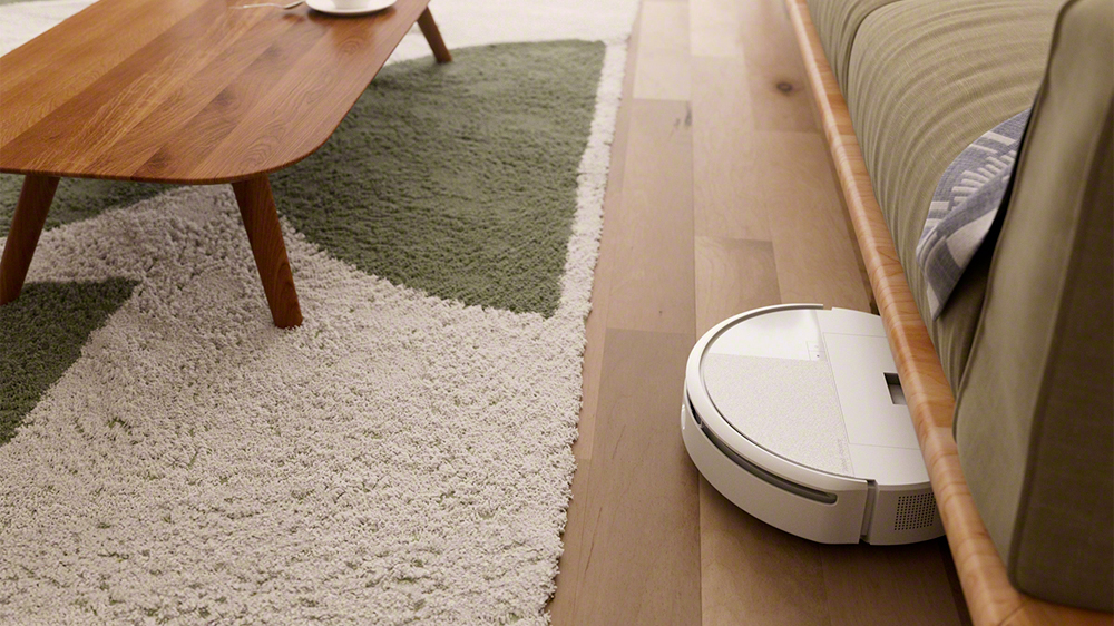 Robotický vysavač iRobot Roomba 205 uklízí v obývacím pokoji_02