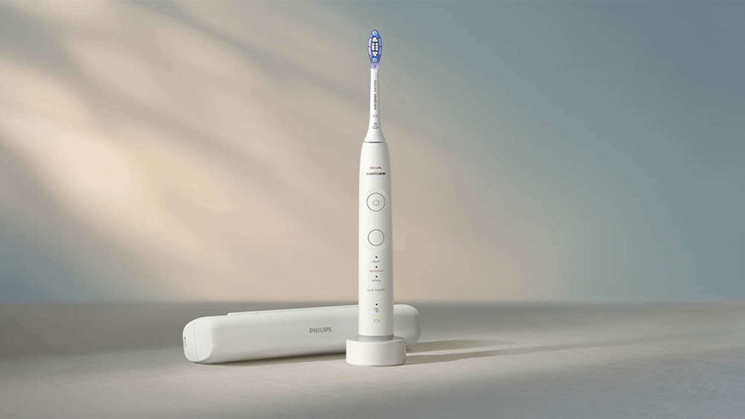 Sonický elektrický zubní kartáček HX7420/01 Philips Sonicare 7100 v bílé barvě s nabíjecí základnou a cestovním pouzdrem