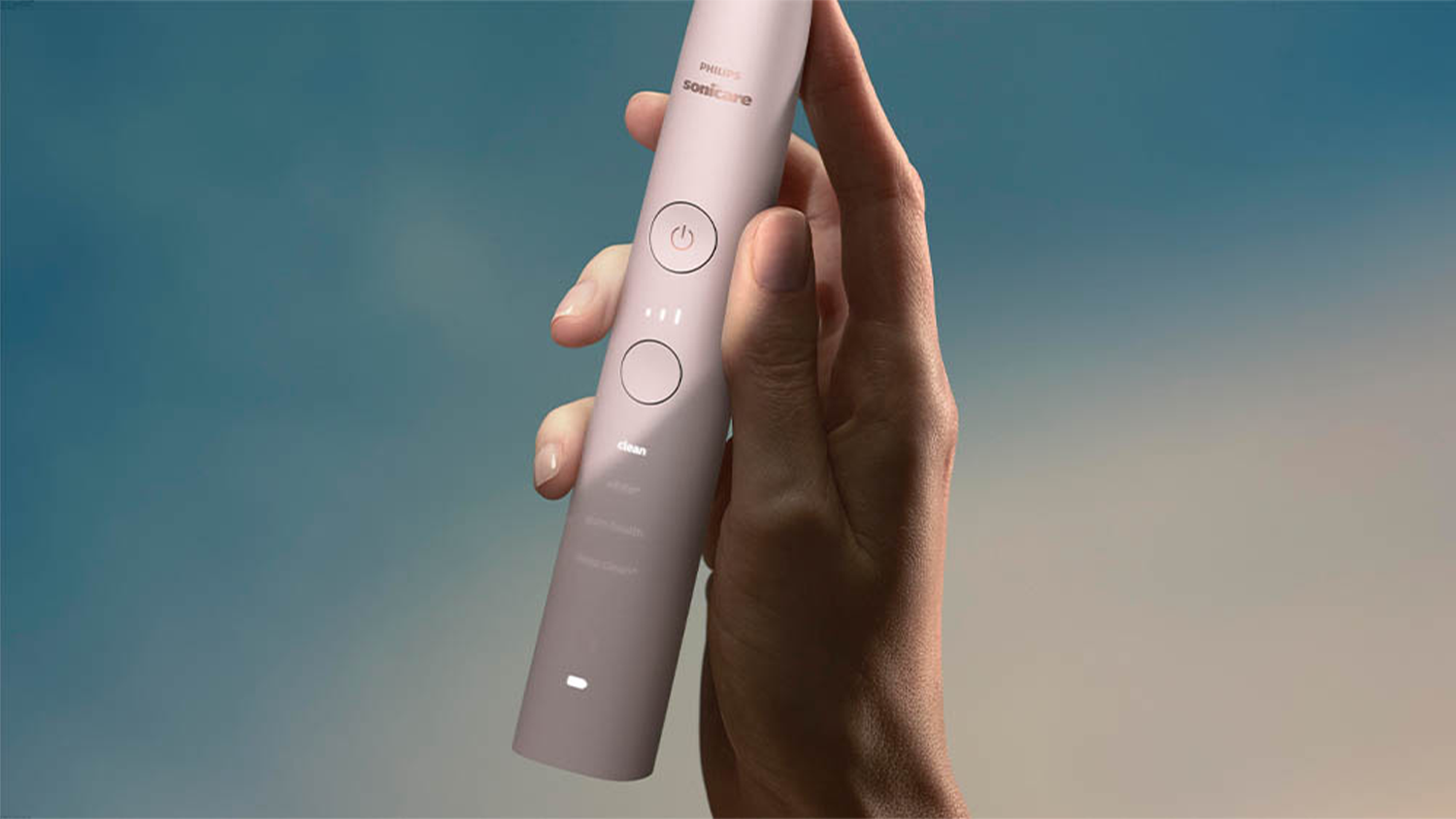 Detail na tělo Sonického elektrického zubního kartáčku HX9911/21 Philips Sonicare 9000 DiamondClean v růžové barvě