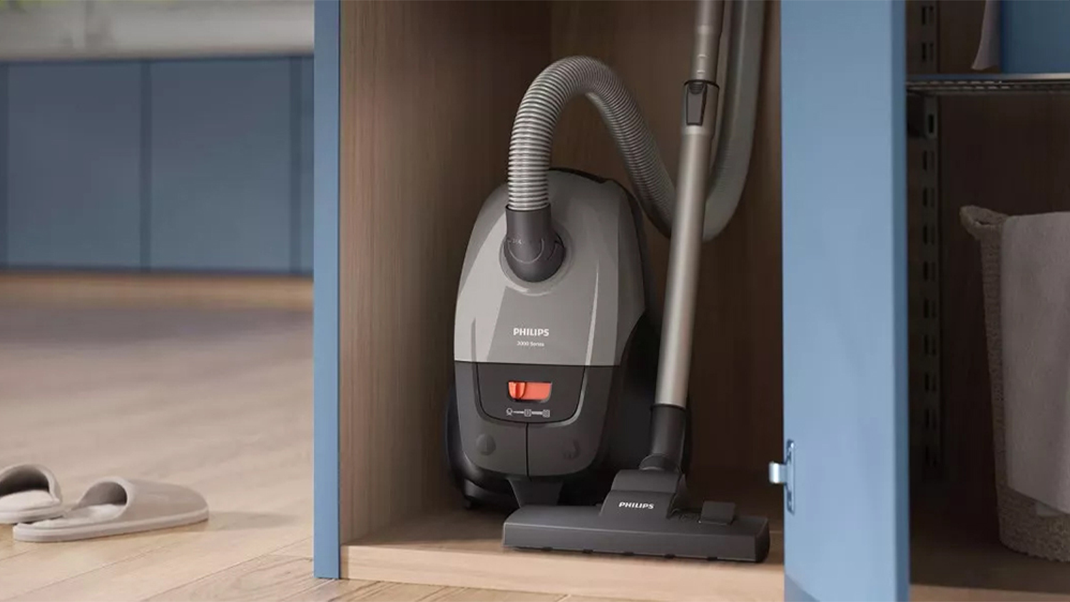 Sáčkový vysavač XD2152/12 Philips Series 2000 uložený ve skříni