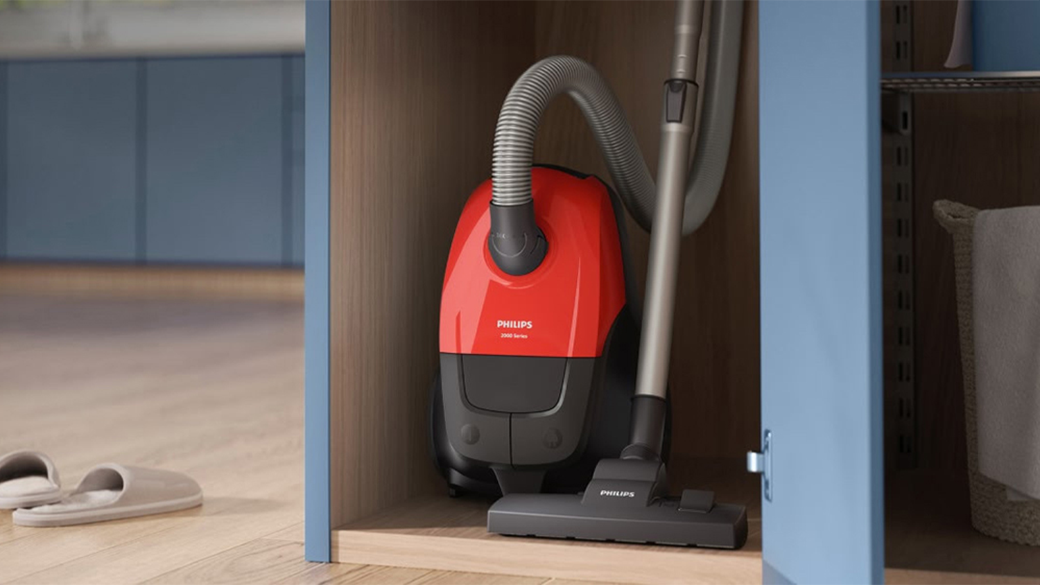 Sáčkový vysavač XD1111/10 Philips Series 1000 uložený ve skříni