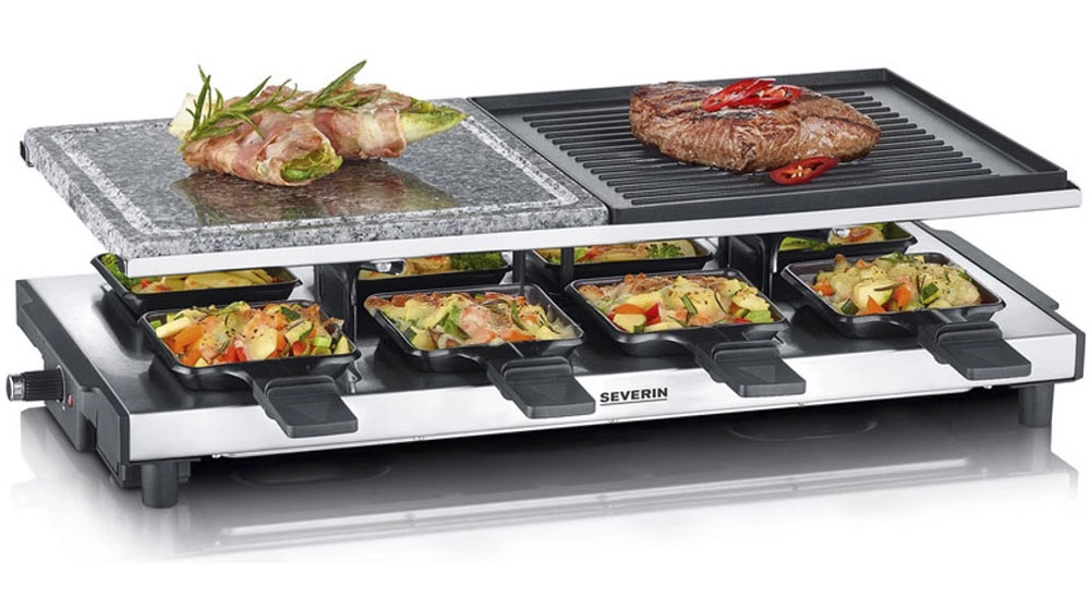Raclette grill, na kterém se připravuje zelenina a maso_02