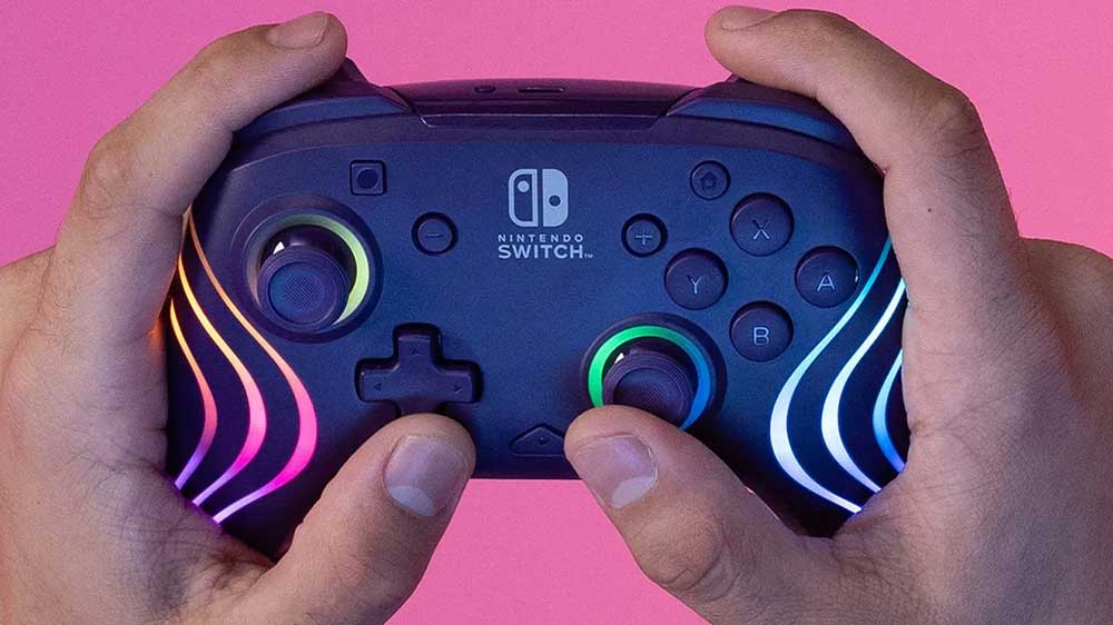 Ruce s bezdrátovým ovladačem PDP Afterglow Wave Ctrl Wireless pro Nintendo Switch_02