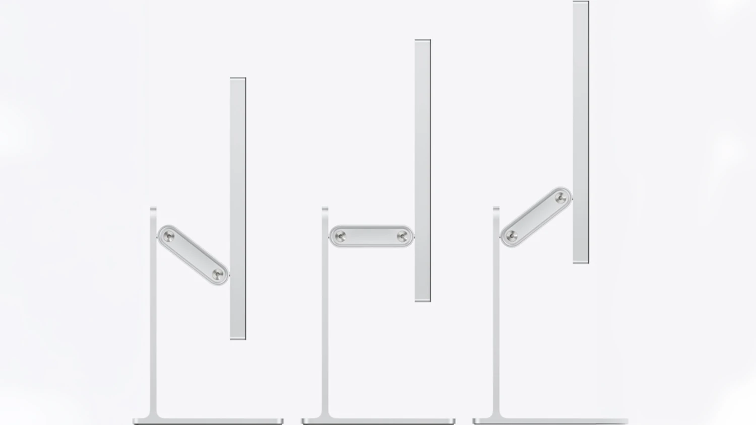 Tři monitory Apple Studio Display XDR 2026 v různ&yacute;ch poloh&aacute;ch