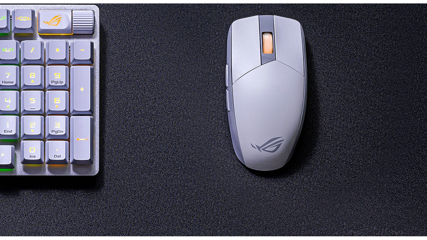 Herná myš ASUS ROG STRIX IMPACT III Wireless vedľa klávesnice