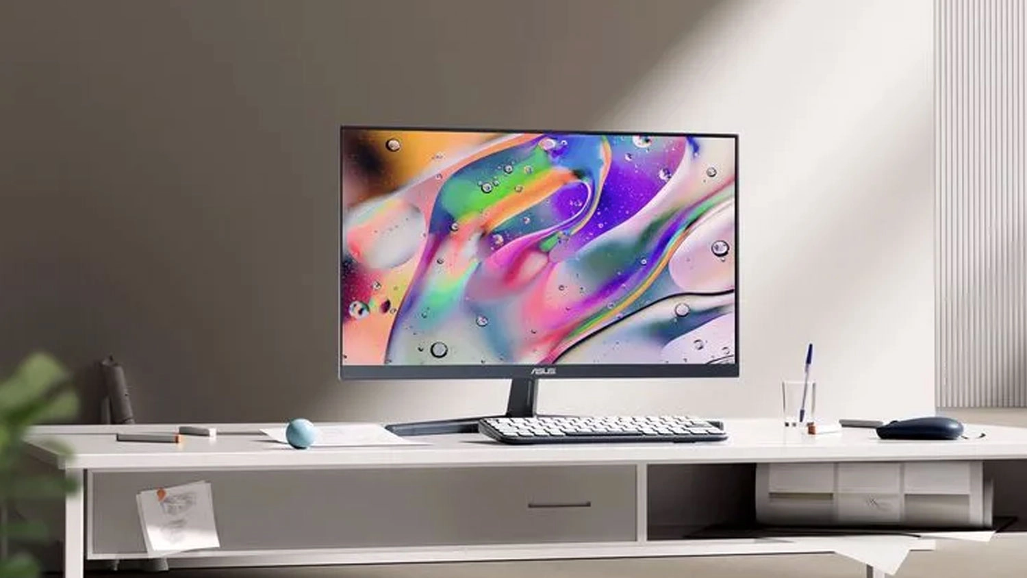 Herný monitor ASUS VU249CFE na stole