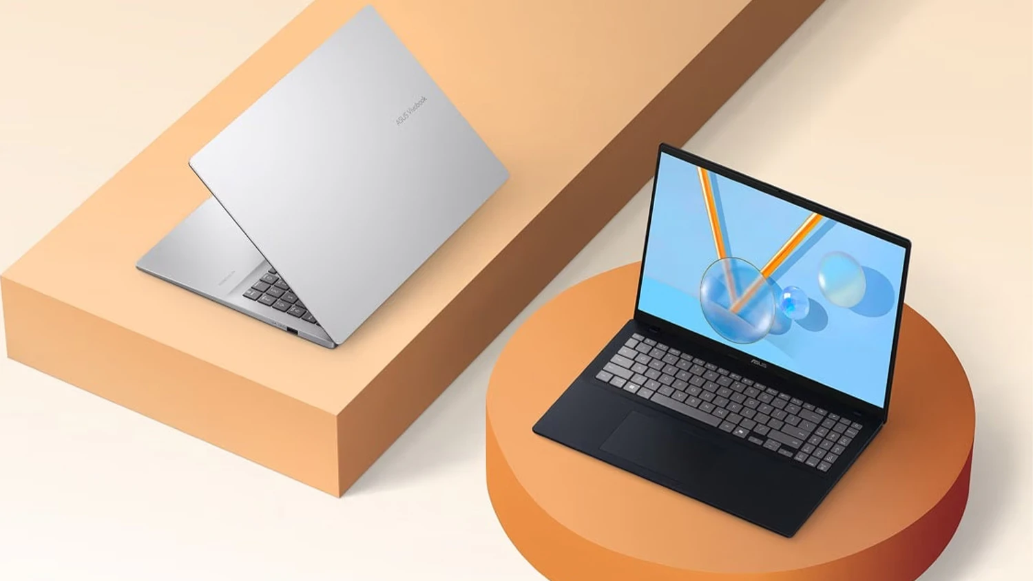Dva notebooky ASUS Vivobook 16 na farebnom pozad&iacute;