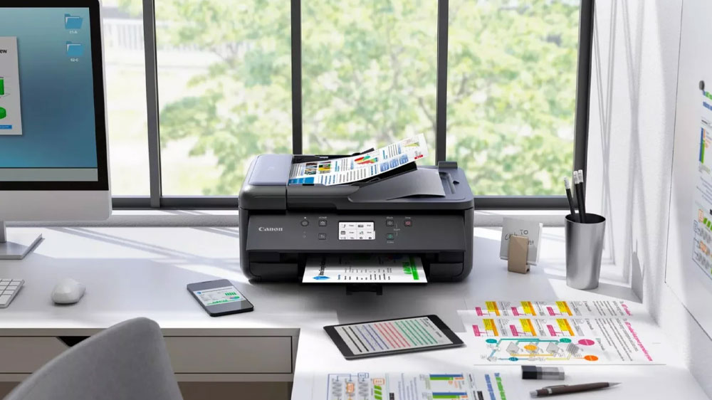 Inkoustov&aacute; tisk&aacute;rna Canon PIXMA TR7650 na pracovn&iacute;m stole_02