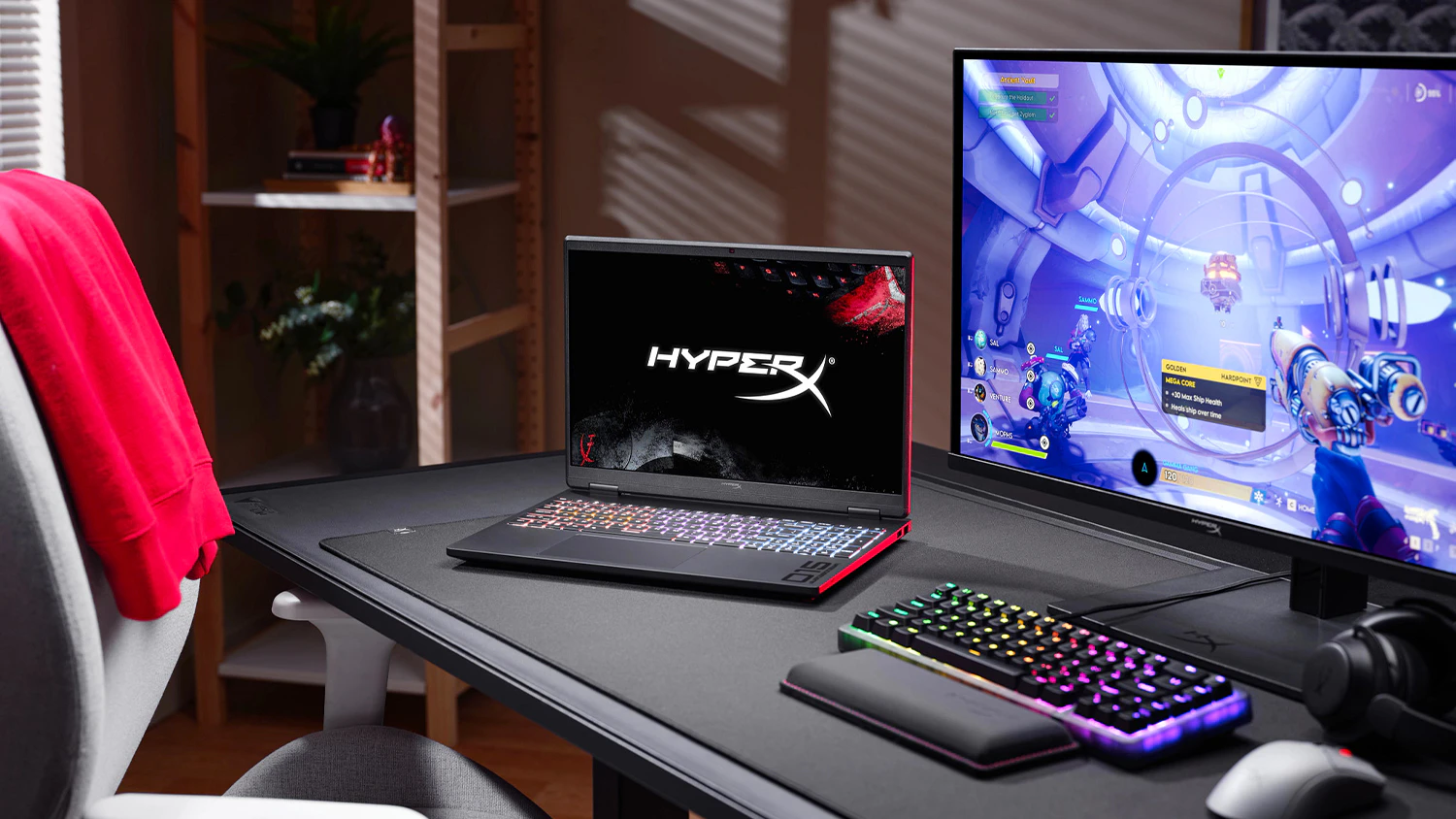 Herní notebook HYPERX OMEN 15 na herním stole