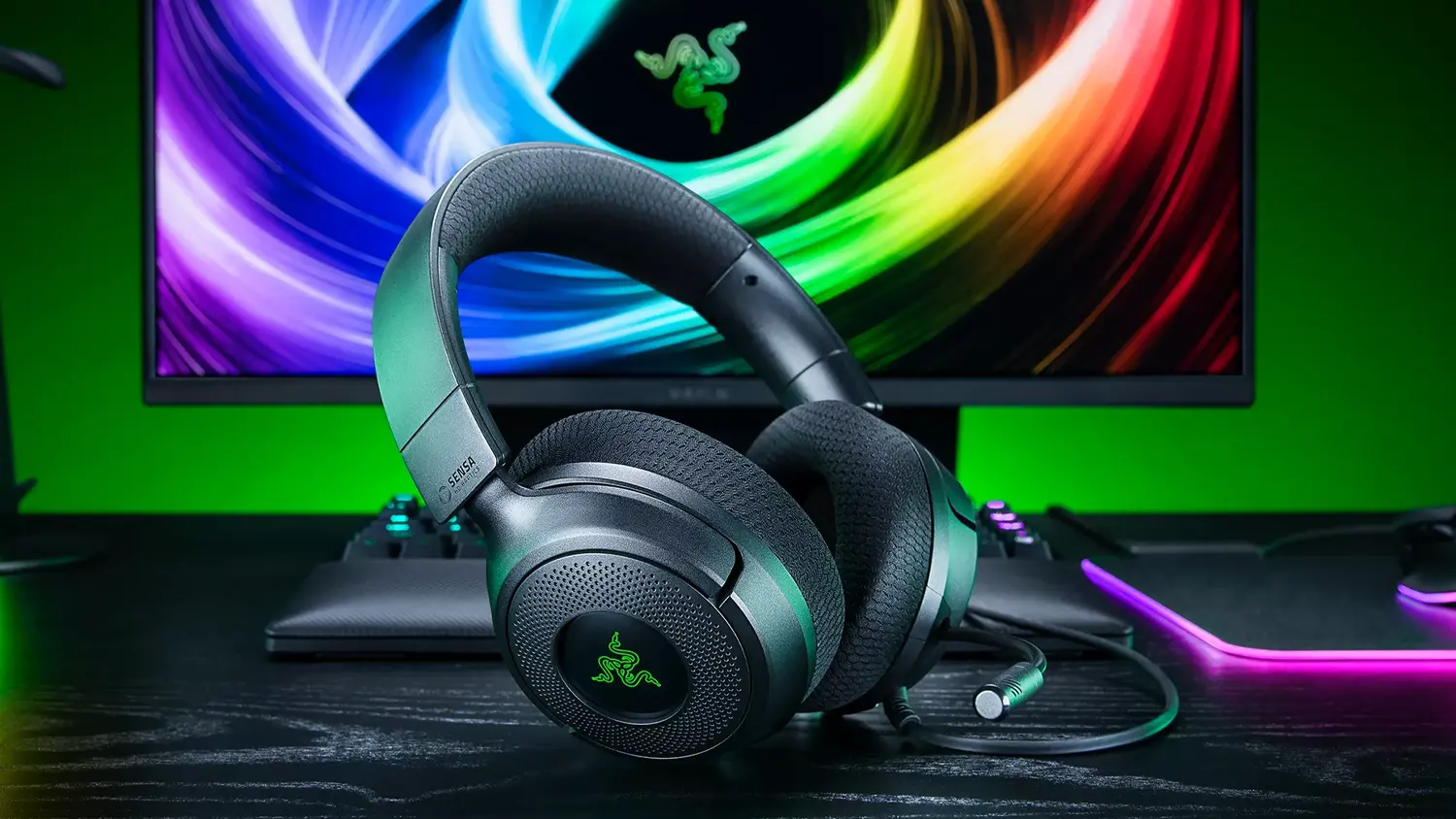 Herné slúchadlá Razer Kraken V4 X Sensa HD Haptics na stole