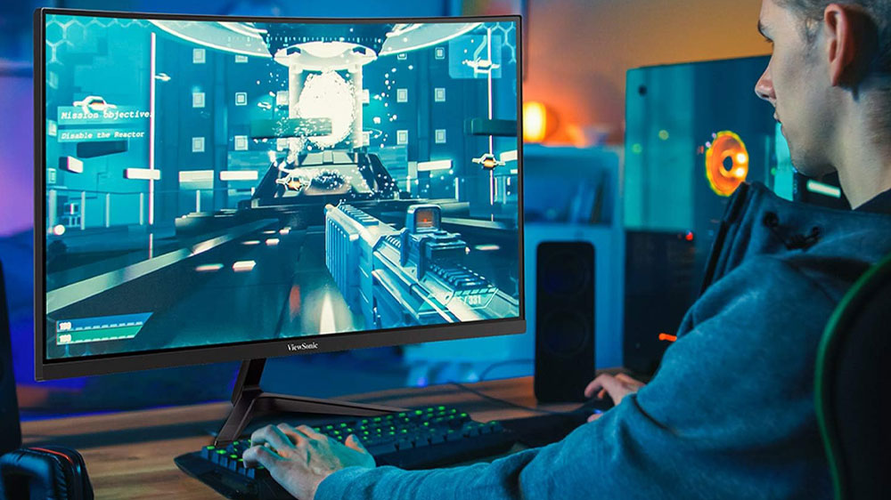 Muž sedící u LED monitoru ViewSonic VX2718-2KPC-MHD_03