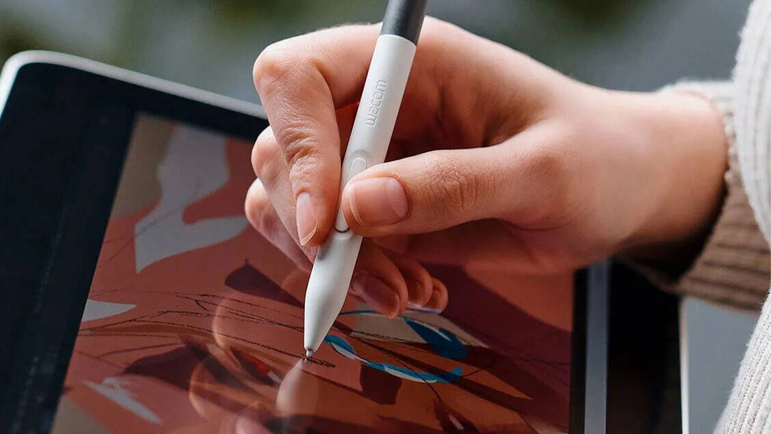 Ruka s perem kresl&iacute;c&iacute; na tabletu Wacom One 14