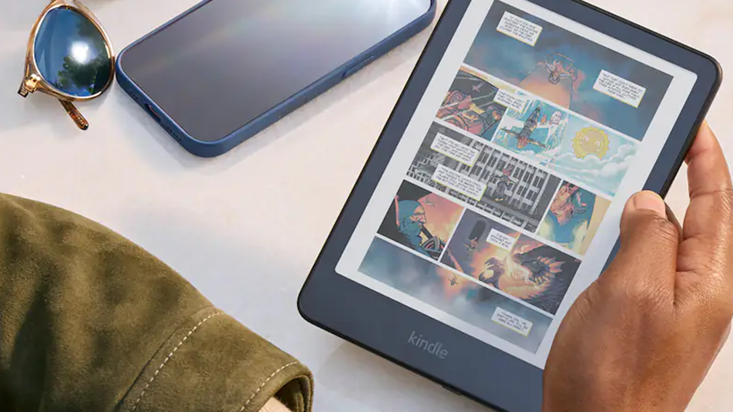 Čtečka Amazon Kindle v ruce
