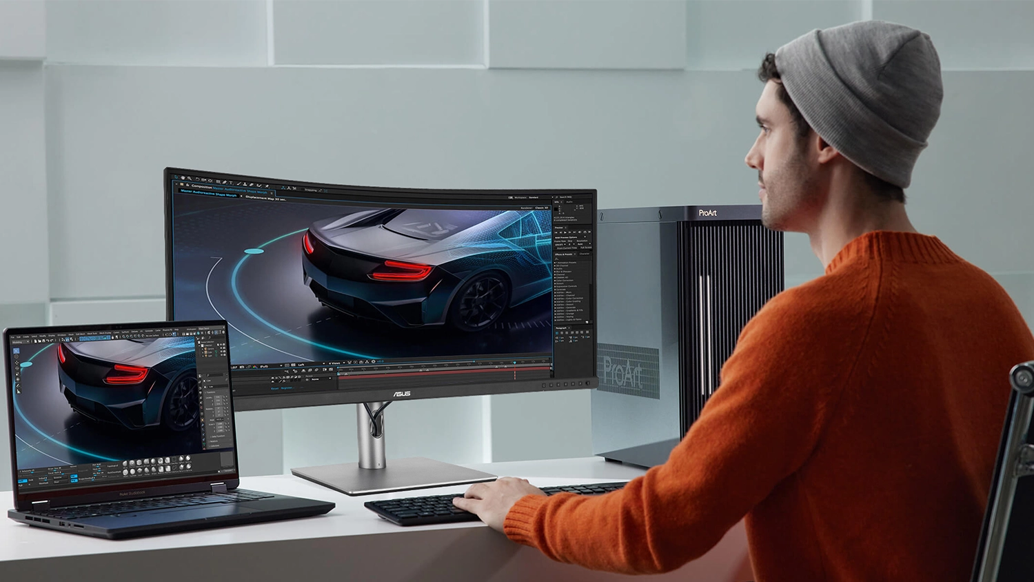 Muž strihá video na monitore ASUS ProArt PA34VCNV