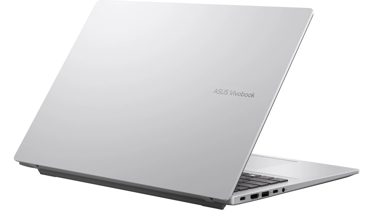 Pohled šikmo zezadu na přivřený notebook Asus Vivobook 16