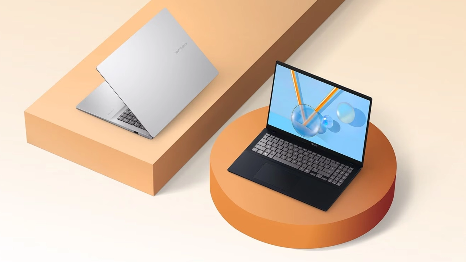 Dva notebooky ASUS Vivobook 18 na farebnom pozad&iacute;
