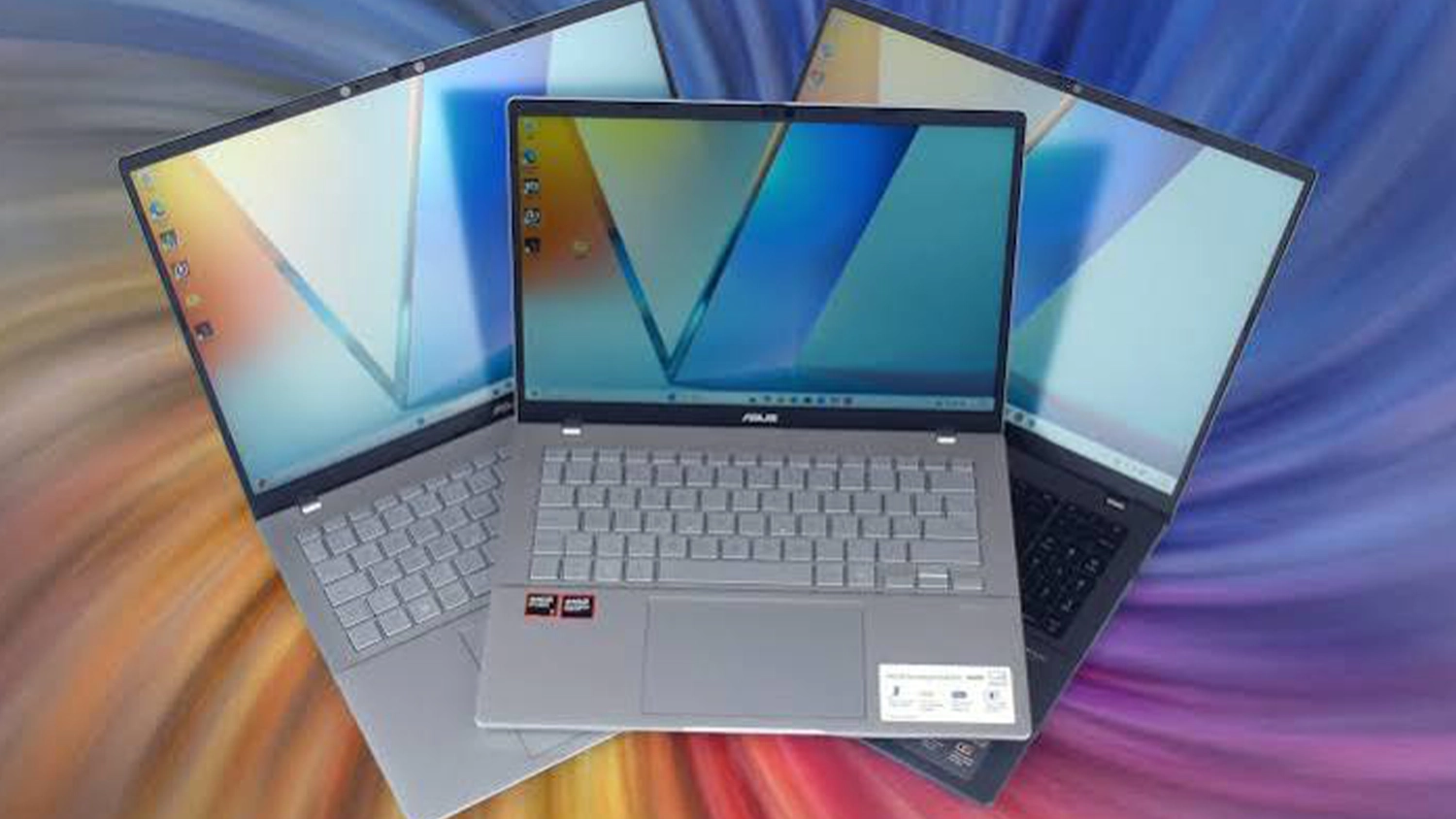 Duhové pozadí s notebooky ASUS