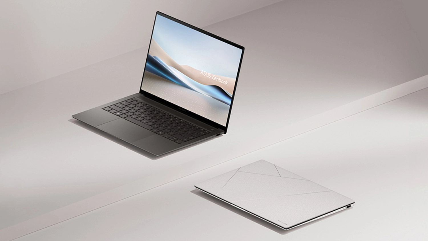 Béžové pozadí s otevřeným a sklopeným ASUS notebookem