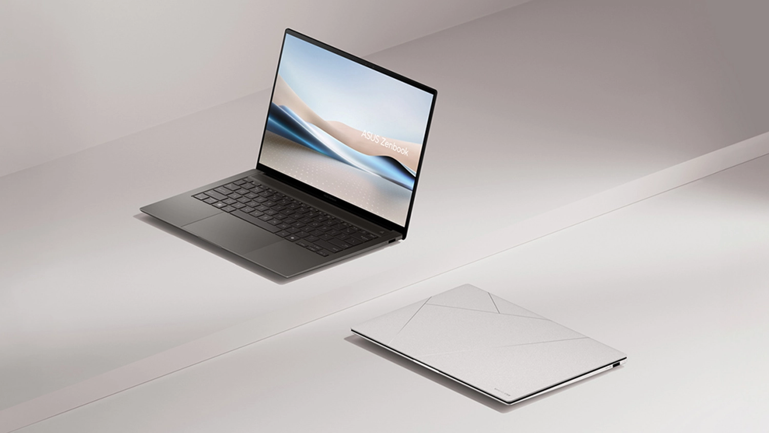 Béžové pozadí s otevřeným a sklopeným ASUS notebookem