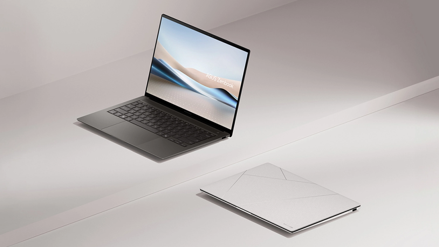Béžové pozadí s otevřeným a sklopeným ASUS notebookem
