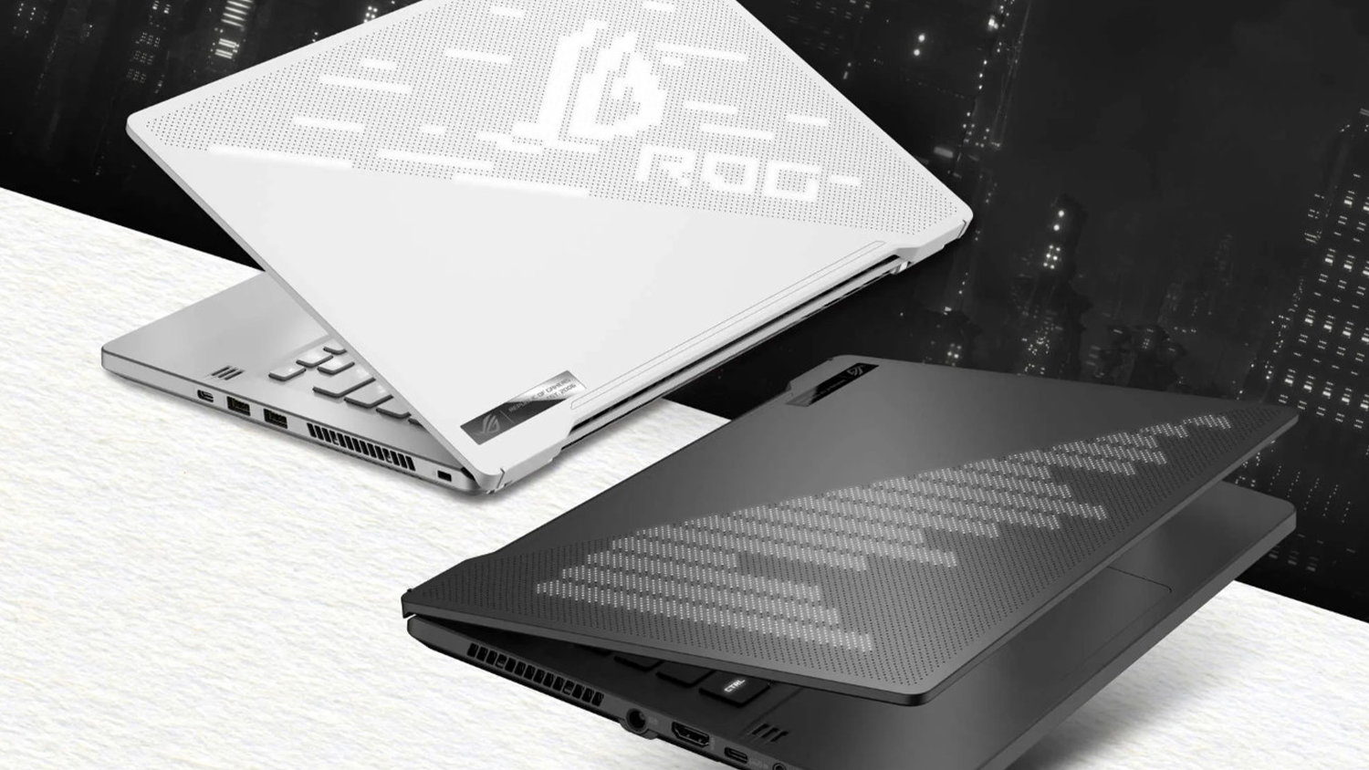 Černob&iacute;l&eacute; modern&iacute; pozad&iacute; se dvěma notebooky ASUS