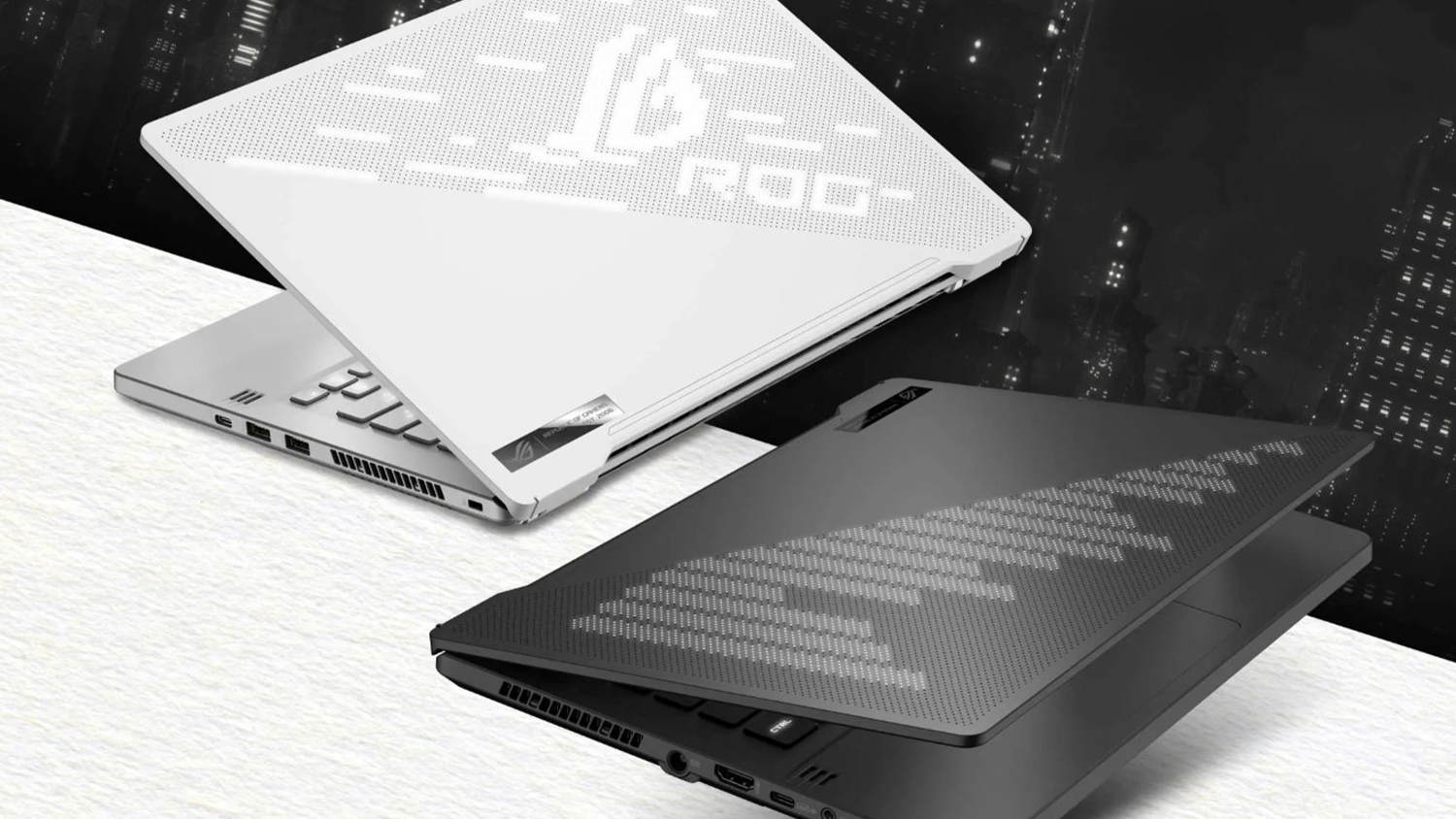 Černobílé moderní pozadí se dvěma notebooky ASUS
