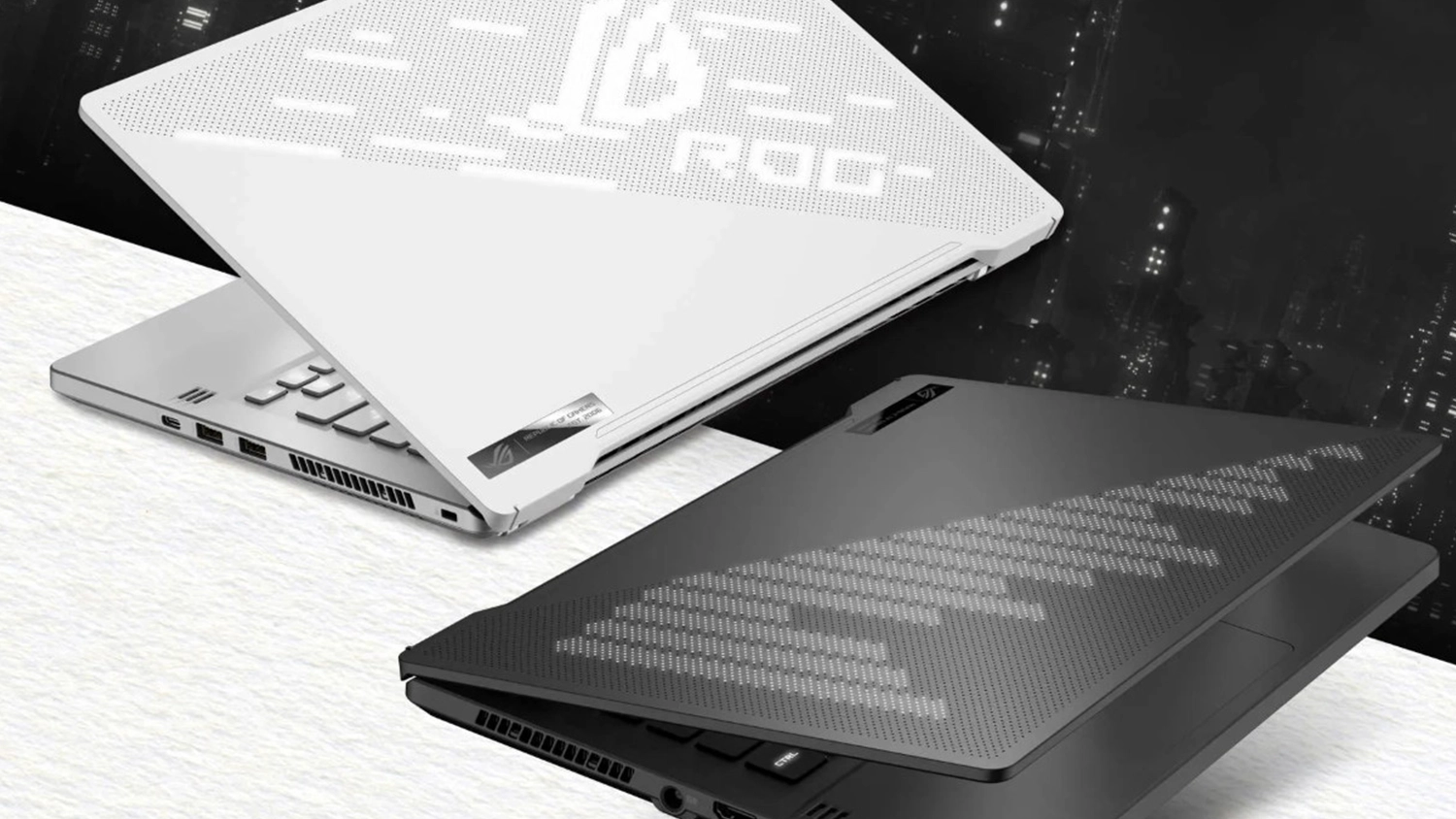 Černobílé moderní pozadí se dvěma notebooky ASUS