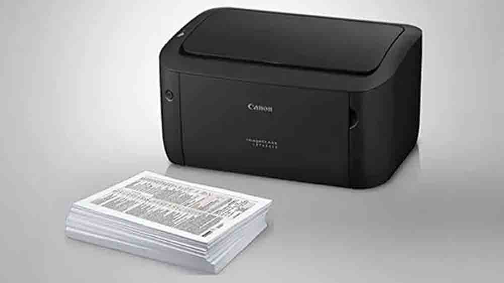 Laserová tiskárna Canon i-SENSYS LBP6030B vedle vytiskmutých dokumentů_03