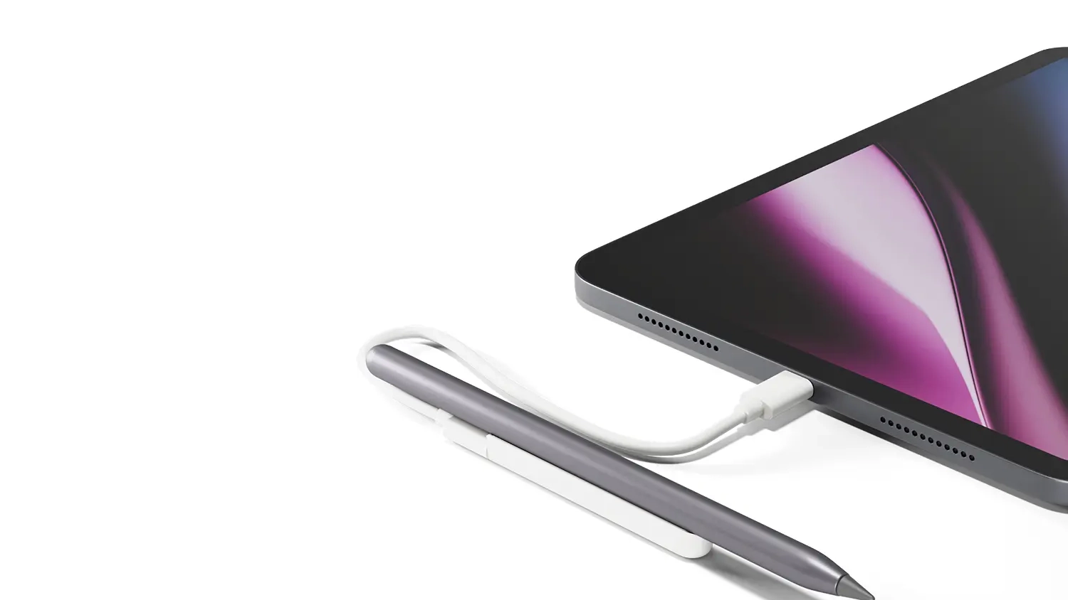iPad s tužkou Epico pro iPad napojenou na nab&iacute;jec&iacute; podložku